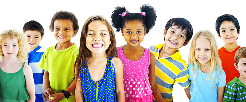 A group of children with diverse skin tones posing together for a photo.